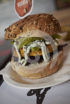 Vegetarian burger with red cabbage and lime mayo