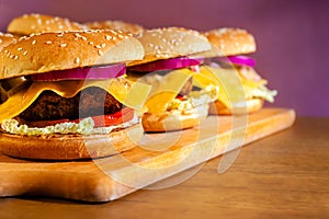 Vegetarian burger on a wooden board harvested in blank space. Stock photo vegan burger with plant foods