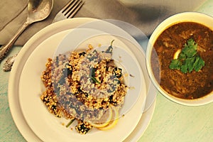 Vegetarian couscous with mushrooms and spinach.