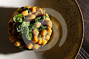 Vegetarian curry dish with chickpeas and spinach