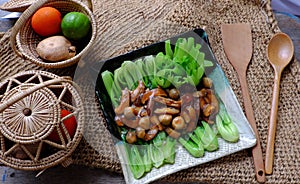 Vegetarian dish for vegans, bok choy sauce with mushrooms