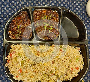 Vegetarian dishes photography, fried rice and manchurian in a plate, lunch wallpaper, food background