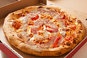 Vegetarian fast food. Margaretha or margarita margherita pizza texture in pizza box. Pizza without meat. Tasty delicious