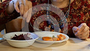 Vegetarian food. Meals during the post. Woman eating vegetarian food. Different vegetables.