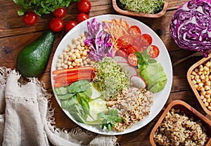 Vegetarian food. Plate of healthy salad with quinoa and vegetables