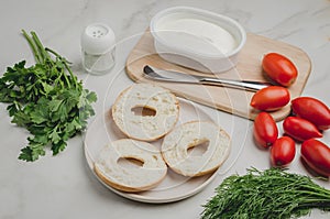 Vegetarian food with round toast, bottle, vegetables and cheese/Healthy food with round toast, bottle, vegetables and cheese on