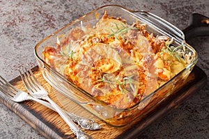 Vegetarian food sweet potato casserole close-up in a glass baking dish. Horizontal