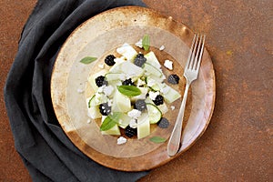 Vegetarian fruit salad melon blackberry and cheese