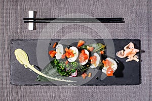 Vegetarian futomaki with cherry tomatoes, avocado, cucumber and