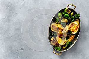 Vegetarian healthy dinner table Fried brussels sprouts zucchini