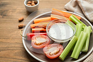 Vegetarian healthy snacks, vegetable snack: carrots, celery, tom