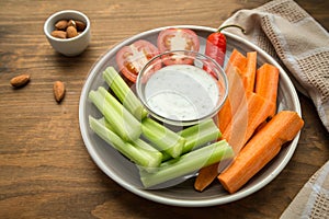 Vegetarian healthy snacks, vegetable snack: carrots, celery, tom photo