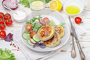 Vegetarian healthy vegetable cutlets of cabbage, potatoes, zucchini, onions and greens