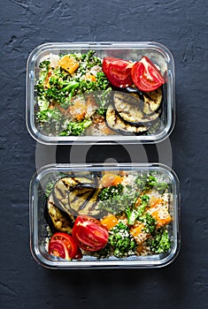 Vegetarian lunch box. Broccoli, pumpkin, couscous salad, grilled eggplant and tomatoes. Healthy diet home food concept. Office foo