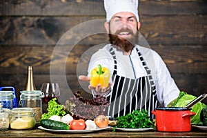 Vegetarian meal. Freshest possible ingredients. Organic food. Fresh ingredients only. Man bearded hipster cooking fresh