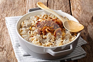 Vegetarian meal: Mujaddara rice with lentils and fried onions cl