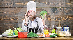 Vegetarian meal. Organic food. Fresh ingredients only. Culinary recipe concept. Man bearded hipster cooking fresh