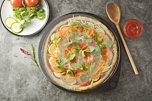 Vegetarian pizza. Cooking process of vegetable homemade pizza with fresh ingredients isolated on dark background. Copy space. Step