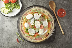 Vegetarian pizza. Cooking process of vegetable homemade pizza with fresh ingredients isolated on dark background. Copy space. Step