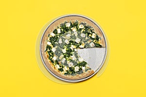 Vegetarian pizza minimalist on a yellow background