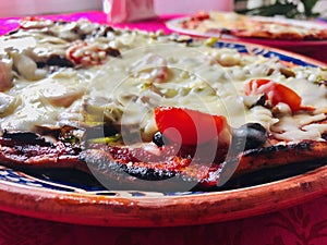 Vegetarian pizza with tomato and cheese. photo