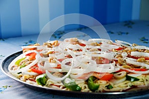 Vegetarian pizza with tomato and peppers
