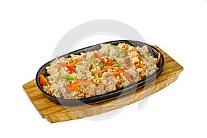 Vegetarian rice with vegetables frying pan isolated