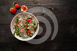 Vegetarian salad with figs, strawberries, grapes, blue cheese dorblu. banner, catering menu recipe place for text, top view