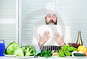 Vegetarian salad with fresh vegetables. Healthy food cooking. Mature hipster with beard. bearded man. chef recipe