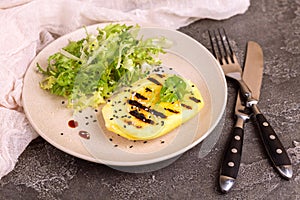 Vegetarian salad with grilled mango, fresh frisee and sesame