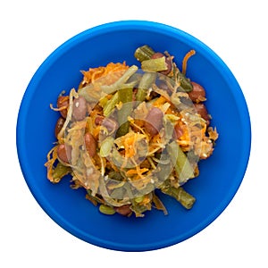 Vegetarian salad. Healthy food. Salad of beans, asparagus, onion, carrot and sesame on a plate isolated on a white background