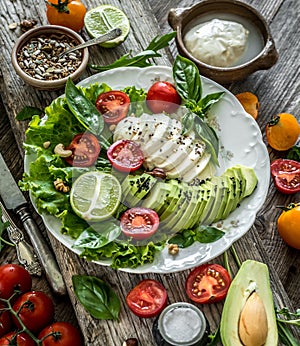 Vegetarian salad with mozzarella and avocado