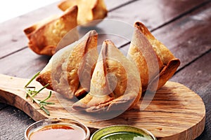 Vegetarian samsa or samosas.Indian special traditional street food punjabi samosa or Coxinha, Croquete and other Fried Brazilian