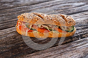 Vegetarian sandwich with tomato, cucumber and sprouts