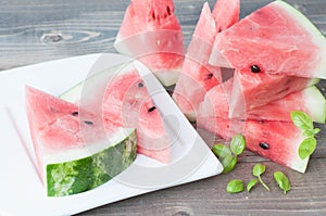 Vegetarian snack. Refreshing watermelon and basil leaves