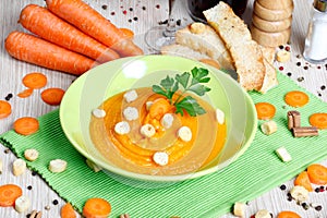 Vegetarian soup with toast in a dish