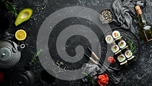 Vegetarian sushi with avocado and tomatoes. Sushi Set. Top view.