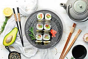 Vegetarian sushi with avocado and tomatoes. Sushi Set. Top view.