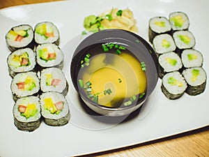Vegetarian sushi and miso soup in a restaurant