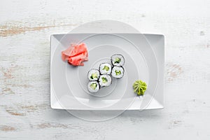 Vegetarian sushi roll with cucumber. Japanese cuisine.