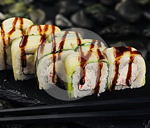 Vegetarian sushi roll with cucumber, philadelphia cheese and crab