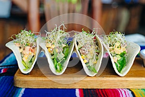 Vegetarian tacos with vegetables and seedlings - Mexican food style