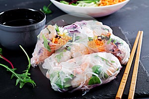 Vegetarian vietnamese spring rolls with spicy shrimps, prawns, carrot, cucumber