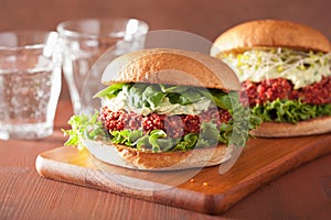 Veggie beet and quinoa burger with avocado dressing