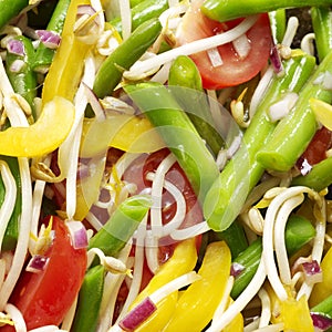 Vegtables salad with tomato, beans, yellow pepper, bean sprouts photo