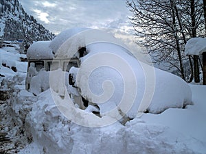 Vehicle buried under the huge snow