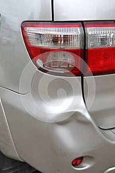 Vehicle car bumper dent and taillight broken collision crash