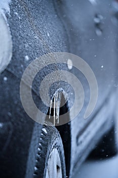 Vehicle covered in ice during freezing rain