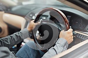 Vehicle, dashboard and hands driving for travel, holiday or roadside adventure. Person, car and steering wheel for