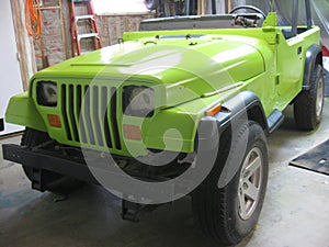 Vehicle with Eyes for Headlights, Lime Green Paint Job, 1990s Vehicle photo